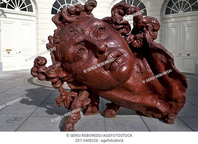 A sculpture from polyester resin by the Mexican artist Javier Marin called Cabeza de Mujer Roja. The Palais de Charles de Lorraine Musee, Brussels, Belgium