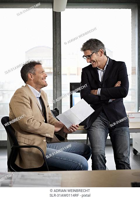 Two men in a meeting