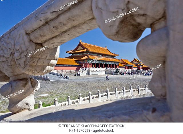 The architecture of the Forbidden City through a window in Beijing, China, Asia