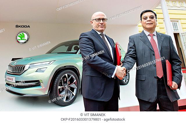 Czech car maker Skoda Auto CEO Bernhard Maier (left) and SAIC Motor Corporation CEO Chen Zhixin (right) signed a memorandum between SAIC Motor Volkswagen and...