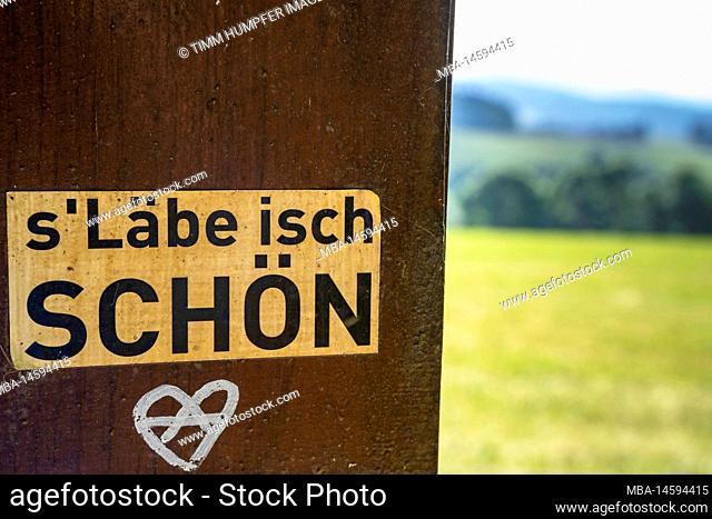 Europe, Germany, Southern Germany, Baden-Wuerttemberg, Black Forest, dialect at a wooden bench near Thurner in the southern Black Forest