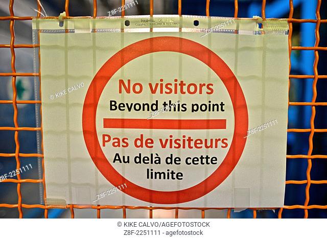 No visitors beyond this point sign. The ATLAS Cavern, located 92 m. below ground, hosts the detector, with its muon wheel