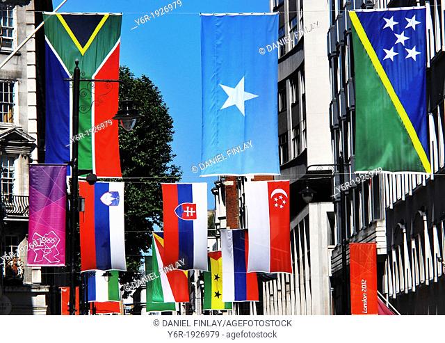 Flags of the world displayed in Jermyn Street near Piccadilly Circus in the heart of London, England, during the 2012 Olympics period