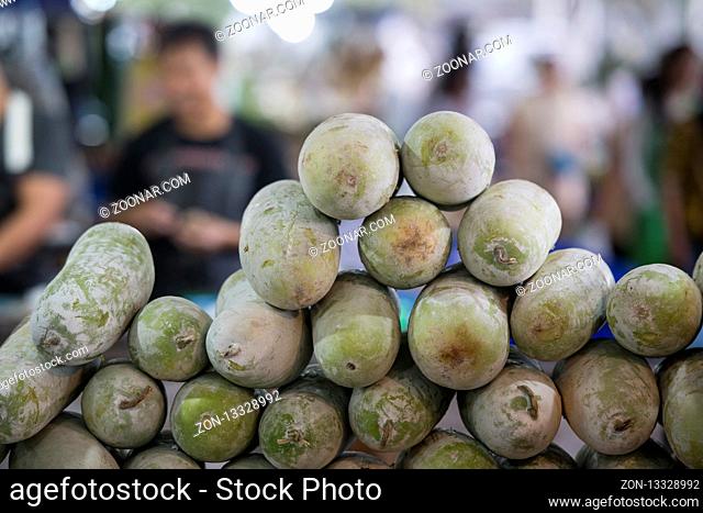 green papaya at the Local morning Food Market in the city of Pattaya in the Provinz Chonburi in Thailand. Thailand, Pattaya, November, 2018