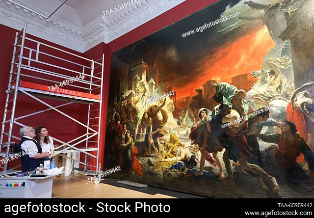 RUSSIA, ST PETERSBURG - DECEMBER 21, 2023: Women stand by Karl Bryullov's history painting The Last Day of Pompeii at a press briefing on the start of the...