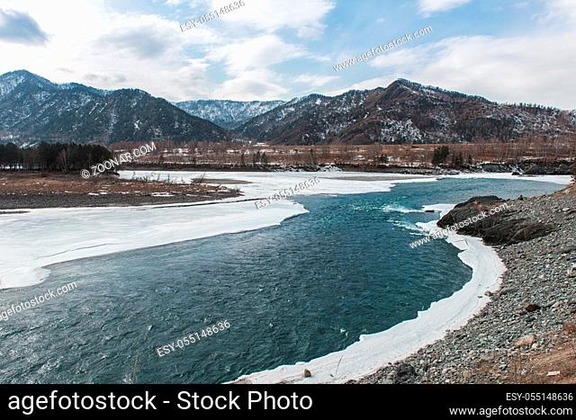 Fast mountain river Katun in Altay, Siberia, Russia. Beauty sunny spring day