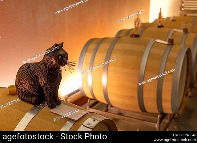 Black cat (schwarze katze) as a symbol of best wine in typical Austrian wine cellar