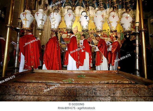 Catholic procession at the Stone of the Anointing, Church of the Holy Sepulchre, Jerusalem, Israel, Middle East