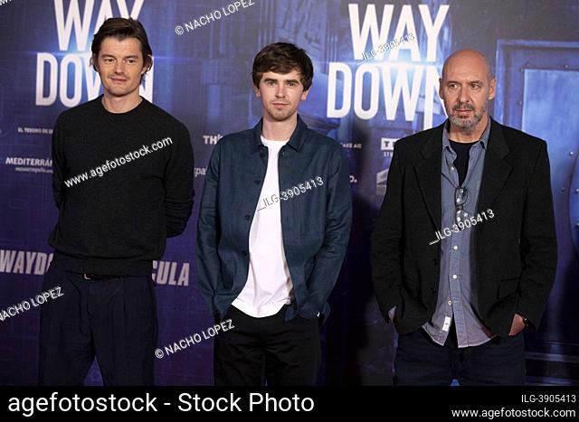Freddie Highmore, Sam Riley and Jaume Balaguero attends to 'Way Down' 'Asalto a la Casa de Moneda' photocall on November 10, 2021 in Madrid, Spain