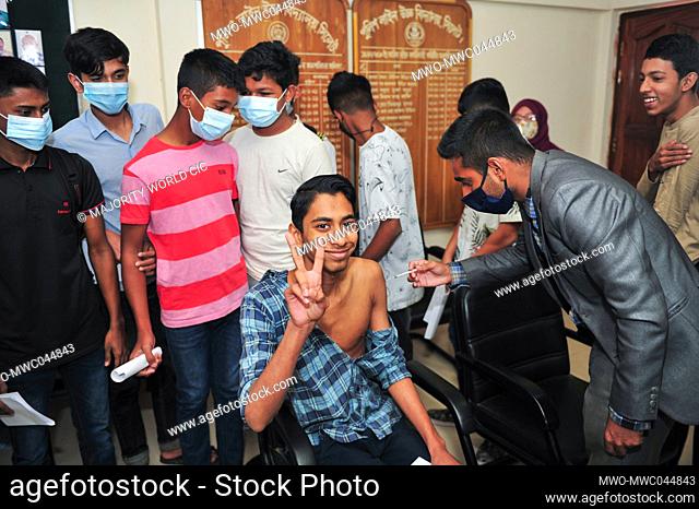 The student is receiving Pfizer covid -19 vaccine at The Sylhet Khajanchibari International School and college. Without Covid-19 vaccination