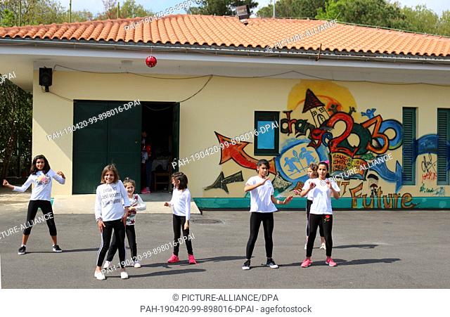 17 April 2019, Albania, Tirana: Children dance in the courtyard of the SOS Children's Village in Tirana. The SOS Children's Village in the suburb of Sauk in the...