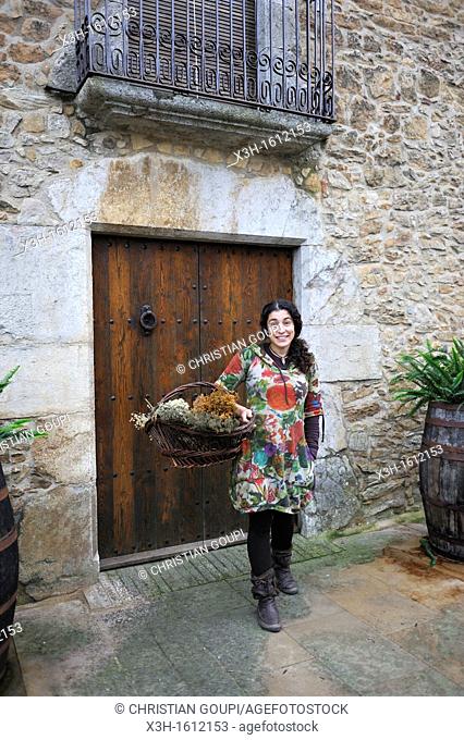Rosa Maria, herbalist Peratallada, small fortified medieval town in the municipality of Forallac Province of Girona Autonomous community of Catalonia, Spain