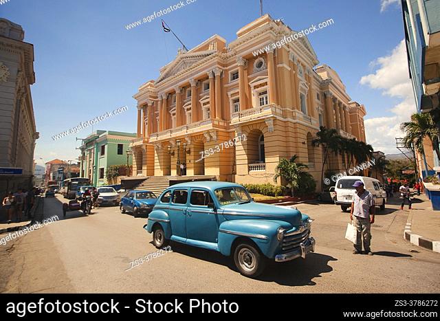Old American cars in front of Palacio Provincial-Provincial Palace at the historic center, Santiago de Cuba, Cuba, West Indies, Central America
