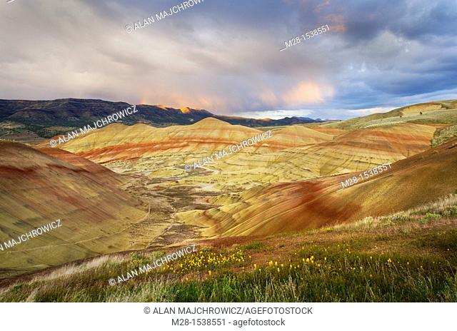 Passing storm at sunset Painted Hill Unit of John Day Fossil Beds National Monument Oregon