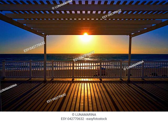 Cancun sunrise at Delfines Beach gazebo at Hotel Zone of Mexico