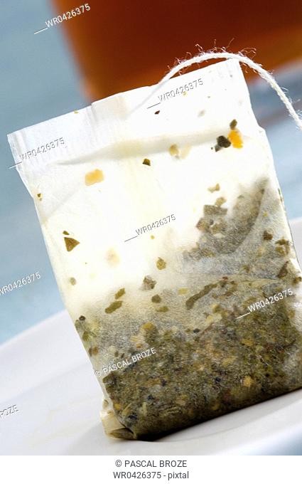 Close-up of a teabag in a plate