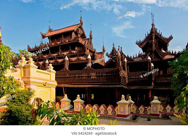 The SHWE IN BIN KYAUNG known as the TEAK MONASTERY was built in 1895 - MANDALAY, MYANMAR - 10/05/2012