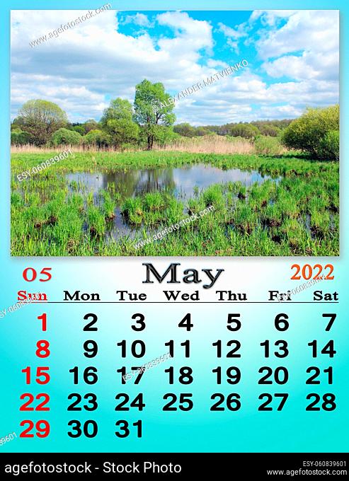 May 2022 Calendar for organizer to plan and reminder on nature background. calendar for May 2022 with image of with flood on the river