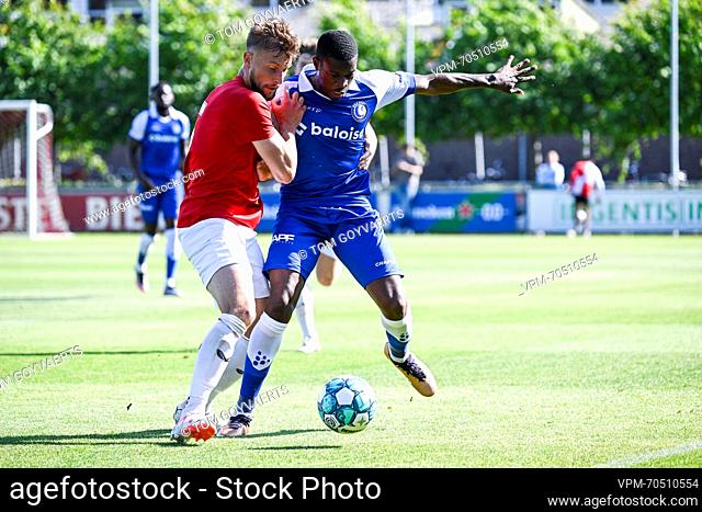 Utrecht's Hidde ter Avest and Gent's Mathias Nurio Fortuna pictured in action during a friendly soccer game between Belgian KAA Gent and Dutch FC Utrecht