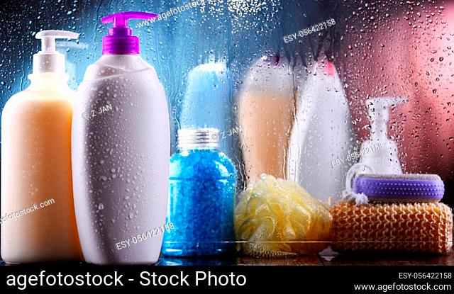 Different containers of body care products in the bathroom