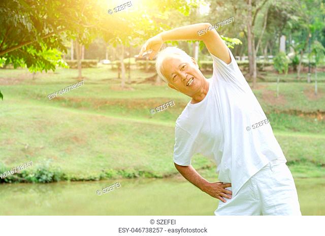 Senior man stretching outdoor