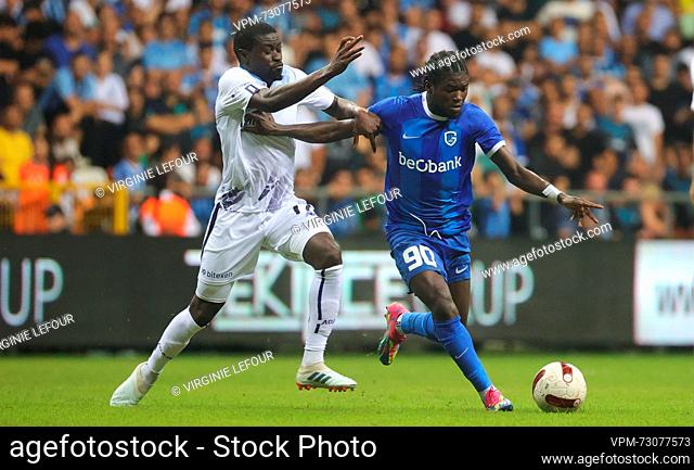 Demirspor's Badou Ndiaye and Genk's Christopher Bonsu Baah fight for the ball during a soccer game between Turkish Adana Demirspor and Belgian KRC Genk