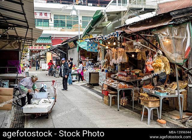 market street with dried fish, traditional fishing village tai o, lantau