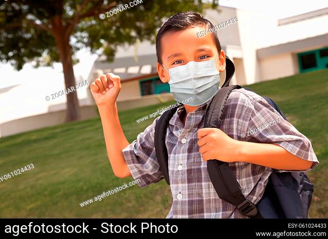 Hispanic Student Boy Wearing Face Mask with Backpack on School Campus