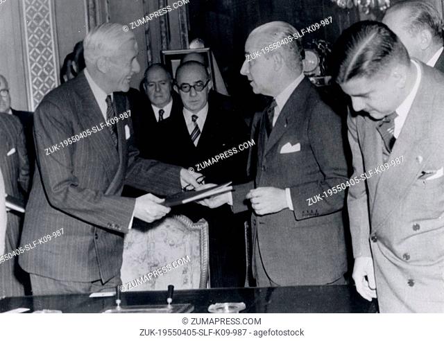 Apr 05, 1955 - Buenos Aires, Argentina - JERONIMO REMORINO and Sir FRANCIS EDWARD EVANS exchange of documents after the signing of the new Commercial Treaty...