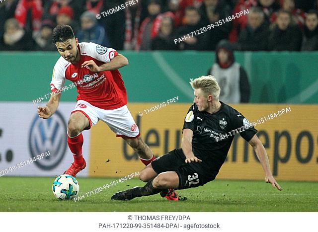 Mainz' Gerrit Holtmann (l) and Stuttgart's Andreas Beck in action during the German DFB Cup soccer match between FSV Mainz 05 and VfB Stuttgart in the Opel...