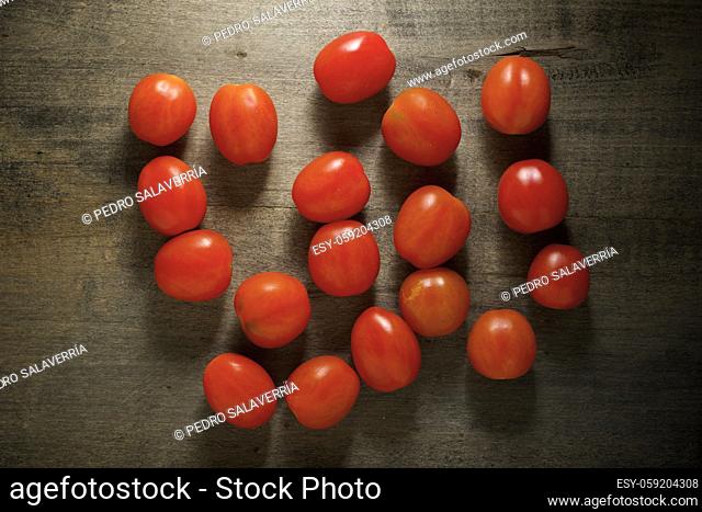 Cherry tomatoes on a wood table