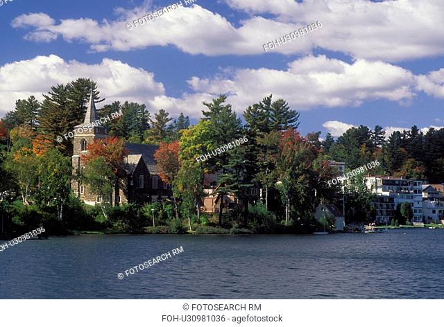 Lake Placid, NY, New York, The Adirondacks, Scenic view of the resort town of Lake Placid along Mirror Lake in the autumn