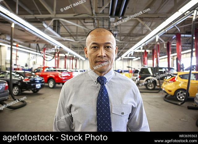 Portrait of Pacific Islander owner of a car repair shop