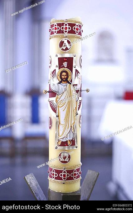 paschal candle - religious symbol with image of Jesus Christ