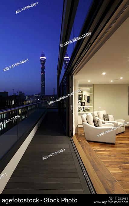 Twilight view from balcony with BT tower in the distance | Architect: Emrys | Designer: Jess Lavers