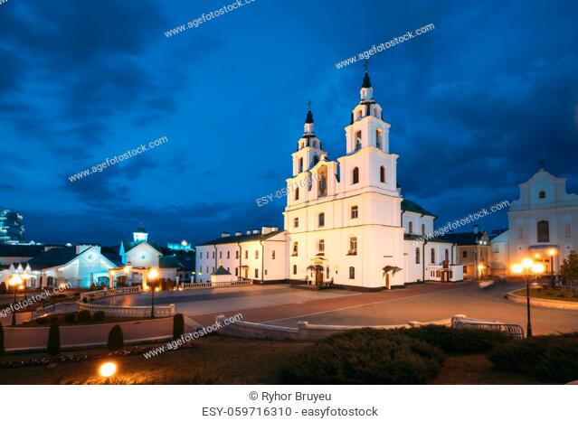 Minsk, Belarus. Illuminated Cathedral Of Holy Spirit In Minsk At Evening Or Night Street Lights . Famous Landmark. Main Orthodox Church Of Belarus At Evening