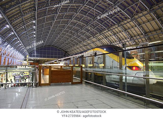 A Eurostar train stationary at St. Pancras International railway station London England UK