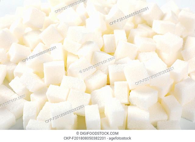 pile of white sugar cubes - close up