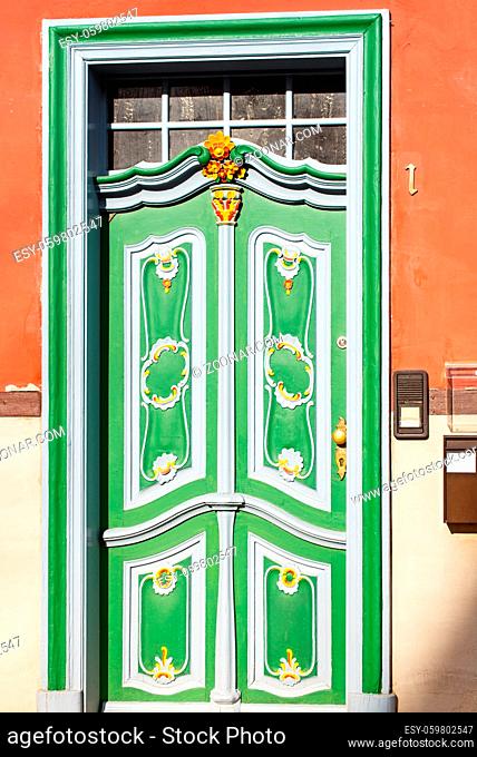 A Green door on a red house in Erfurt