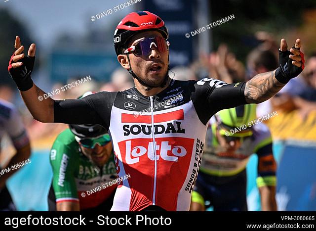 Australian Caleb Ewan of Lotto Soudal celebrates as he crosses the finish line to win stage five of the Benelux cycling tour, from Riemst to Bilzen (188 km)