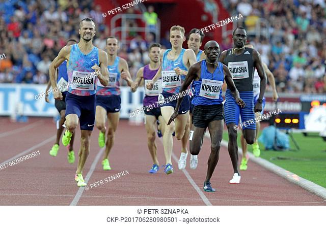 Keanyan athlete Nicholas Kipkoech (front), Czech athlete Jakub Holusa (left) and Czech athlete Filip Sasinek (center) compete in the 1000 metres race during the...