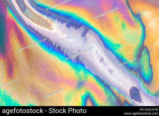 Iridescent rainbow-like texture. Full frame abstract colorful background