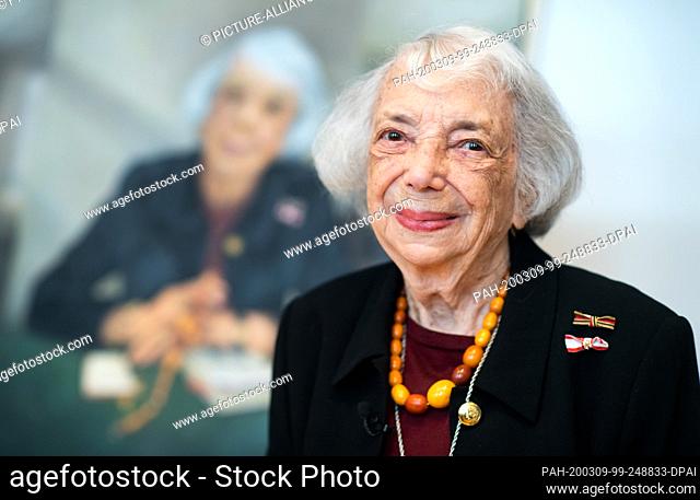 09 March 2020, Berlin: Margot Friedländer is standing in front of her portrait of honorary citizen at the ceremonial unveiling in the Berlin House of...