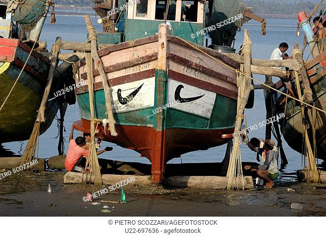 Chapora, Goa India: a fishing boat repainted at the local beach