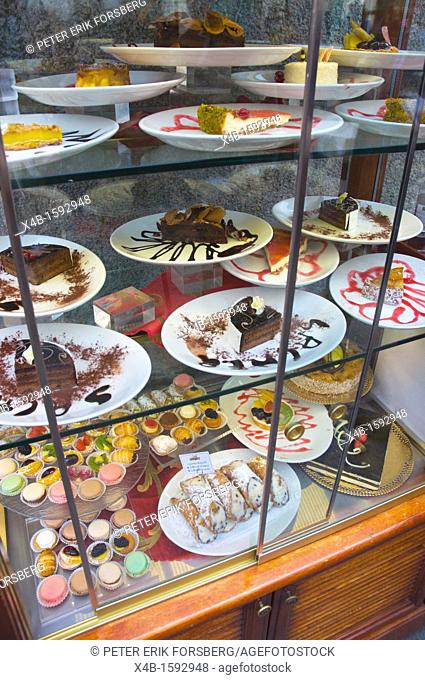 Sweets cakes in window of cafe central Milan Lombardy region Italy Europe