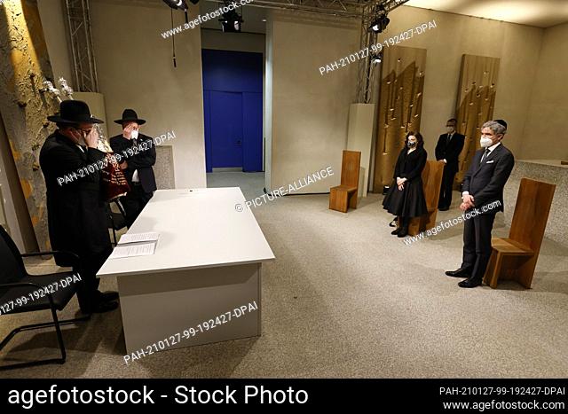 27 January 2021, Berlin: Stephan Harbarth (r), President of the Federal Constitutional Court, and publicist Marina Weisband watch as Rabbis Elias Dray (l-r) and...