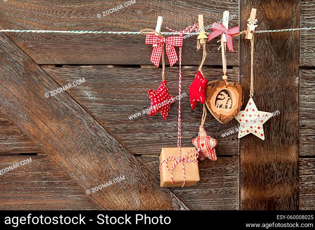 Rustic wooden christmas background with festive ornaments
