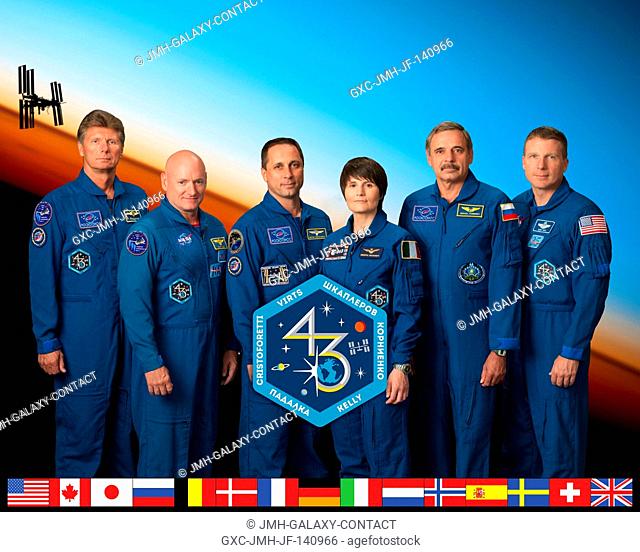 Expedition 43 crew members take a break from training at NASA?s Johnson Space Center to pose for a crew portrait. Pictured from the right are NASA astronaut...