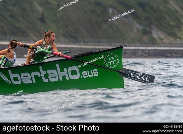 Crew of Hondarribia rowing boat in action during XV Zarauzko Ikurrina women’s regatta of the ACT Euskotren League (The Association of Clubs of rowing boats)
