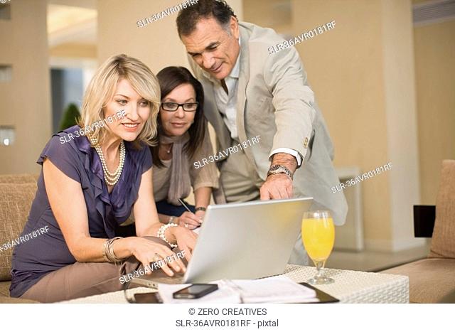 Business people working in lounge